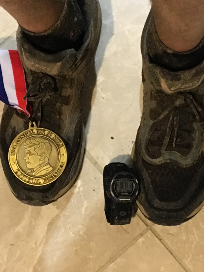 Muddy Shoes and Medal